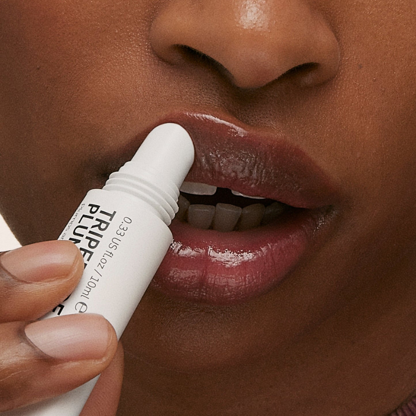 tripeptide-plumping-berry-lip-balm-s8 ApplicationBerry.jpg